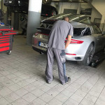 Mechanic working on car